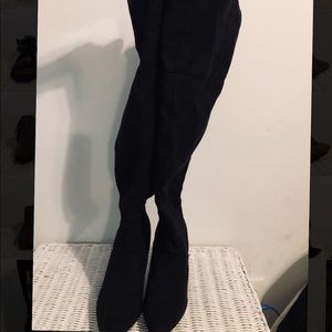 Thigh-high heeled boots